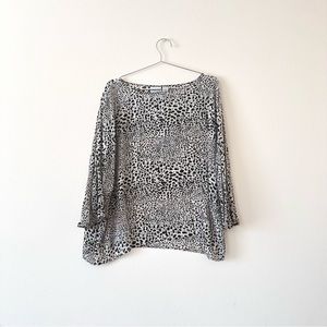 silky semi sheer leopard print blouse